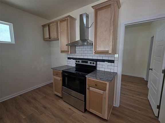 3rd image of 100 E 7th St