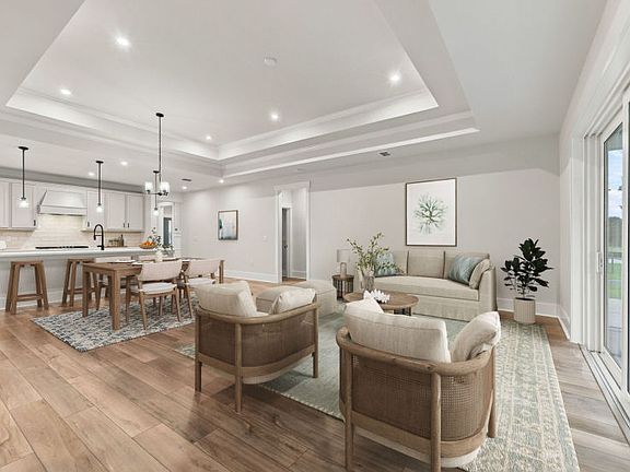 Open-concept kitchen and gathering room in the Azle floorplan with seamless flow for entertaining.