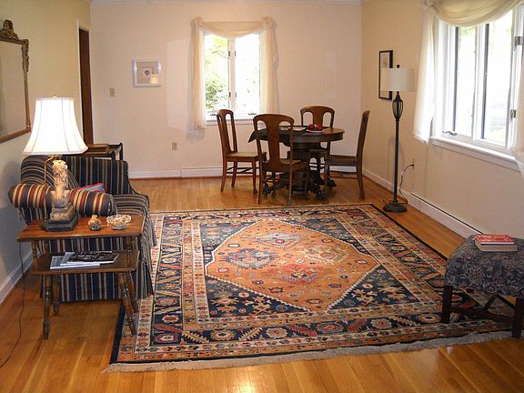 Large bright living room. Windows have been replaced.