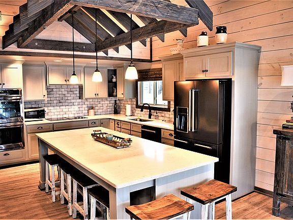 Image 2: Beautifully updated kitchen w/ Quartz