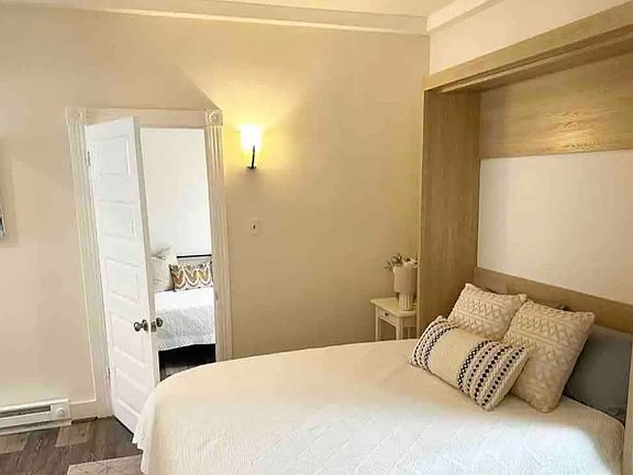 Living room with queen murphy bed