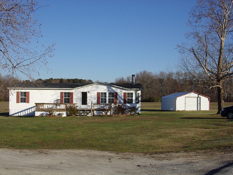 Home, front yard and shed