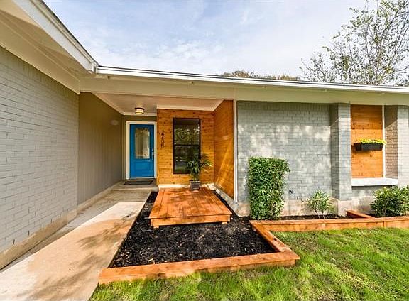 Uniquely styled with cedar accent siding and deck.