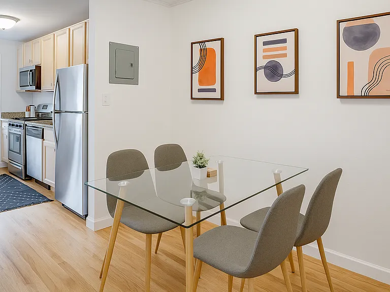Modern and open dining space_perfect for meals or remote work.