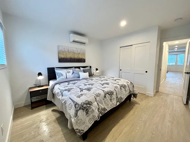 Sleep like a king: Retreat to our inviting bedroom, complete with a spacious closet and a sumptuous king bed.