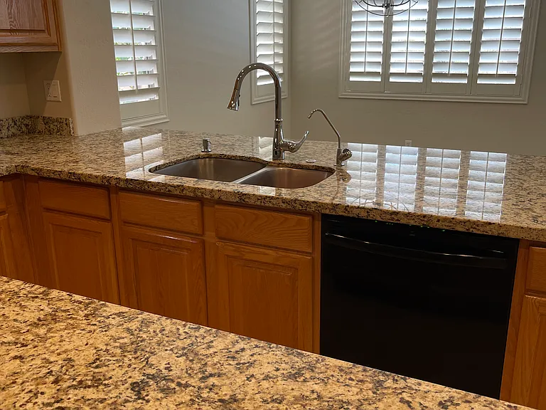 Kitchen island and peninsula, looking through to dining room.