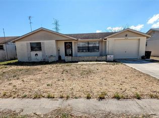 5930 Della Dr, Holiday, FL 34690