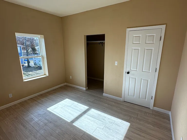 Bedroom approximately 16x14 plus a large walk in closet.