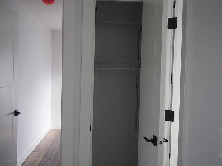 Coat/Linen Closet