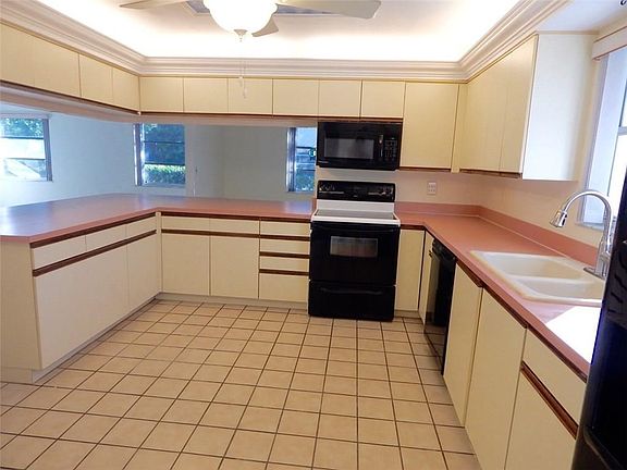 HUGE Kitchen. View from entry way. View of Kitchen and Dining Room