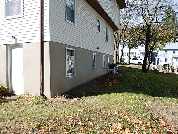 Backyard w/basement entrance.