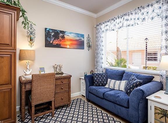 Cozy Sitting Area with a Desk...