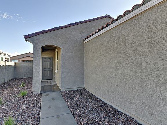 Enter your home through the covered front porch.