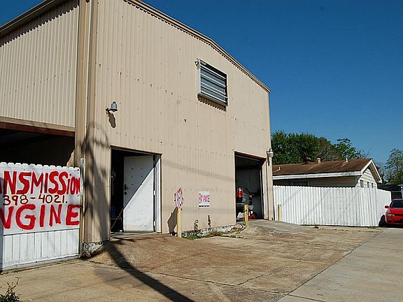 Warehouse currently used as a mechanic shop.  4 yr lease is in affect.