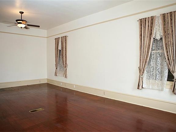 Living area with Aramco shutters on windows.