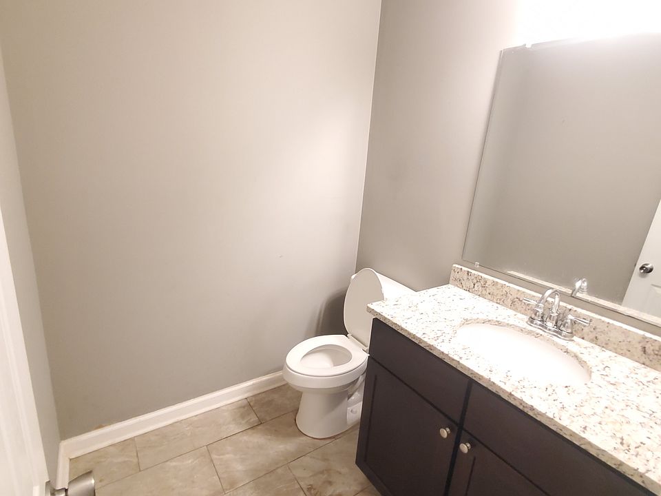 Half bath downstairs (between living room and dining/kitchen)