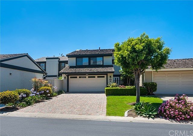 Courtyard Gated Entry +Long Driveway