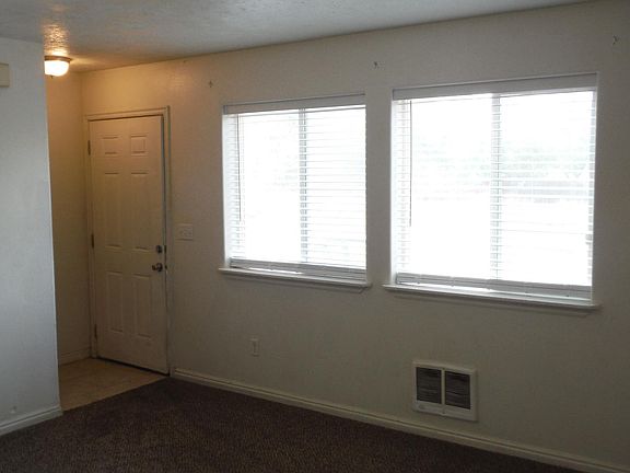 Living Room Looking toward the front door and windows.