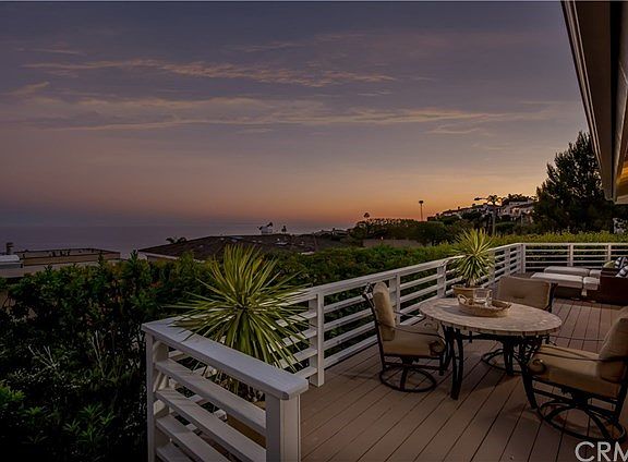 Entertain, dine al fresco, and relax with ocean sunset and twinkling lights views.