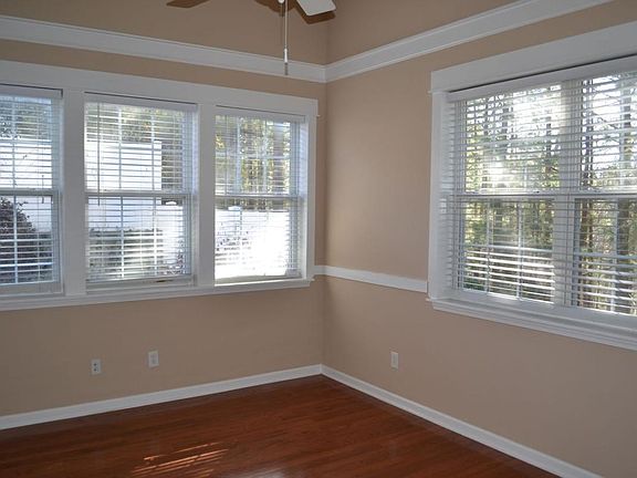 Great room with additional trim and lots of windows for light