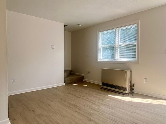 living room and stairs to second floor.