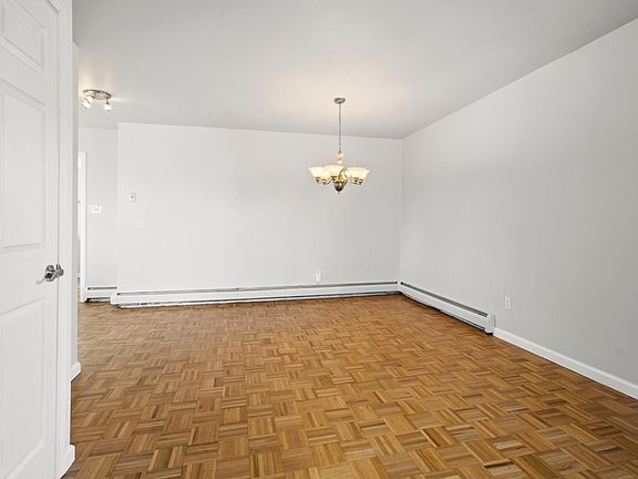 Dining room off of the kitchen flows into the living room