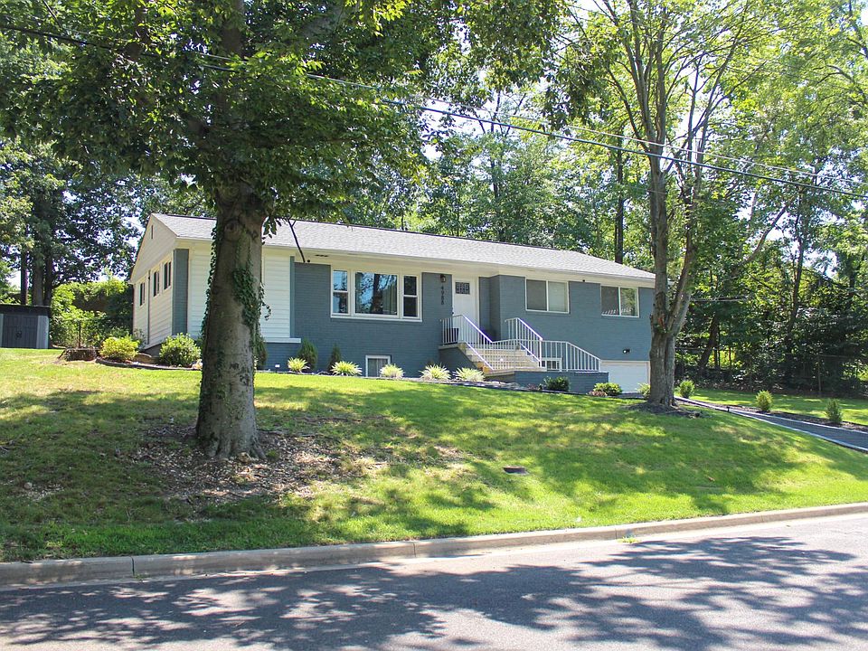 Large front yard with landscaping