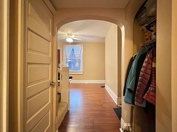 First floor hallway (pictured door to basement, standing beside entrance to office)