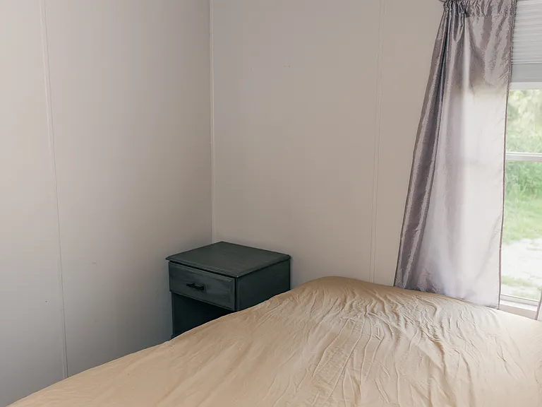 First bedroom, adjacent to guest bathroom