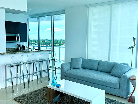 Living Room (motorized solar shades on all windows)