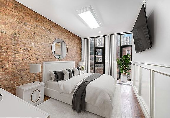 2nd image of 214 E 49th St APT 3