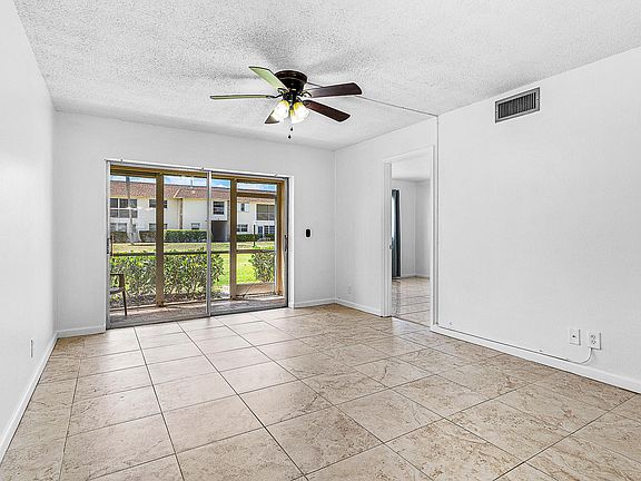 4th image of 9855 Sandalfoot Boulevard #305