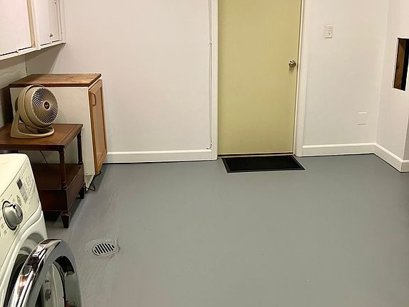 Entrance door to apartment via laundry room.