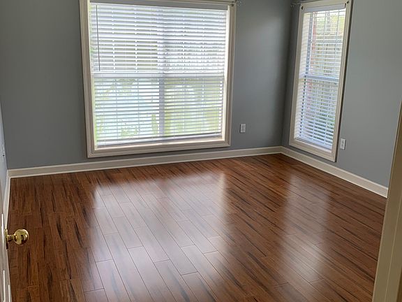 Master bedroom with vaulted ceiling.