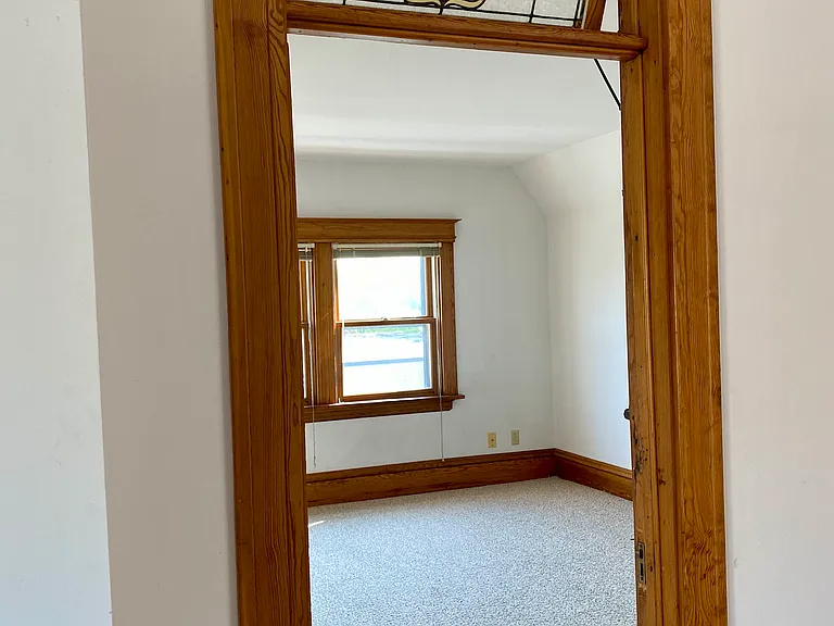 Doorway to study/guest room w/leaded glass.