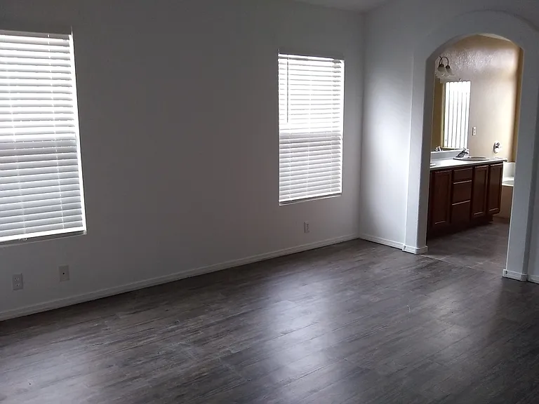 primary bedroom with easy access to spacious bath area