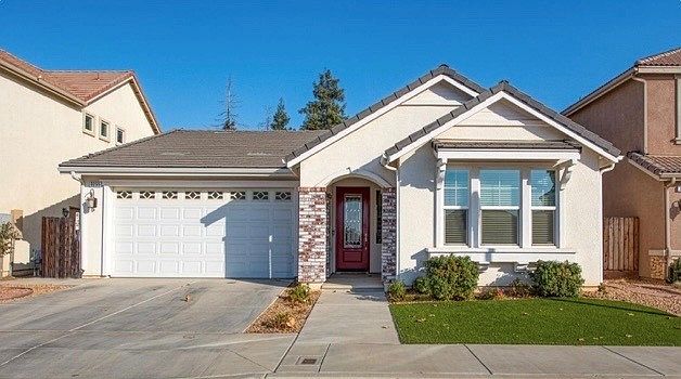 outside of home and 2 car garage