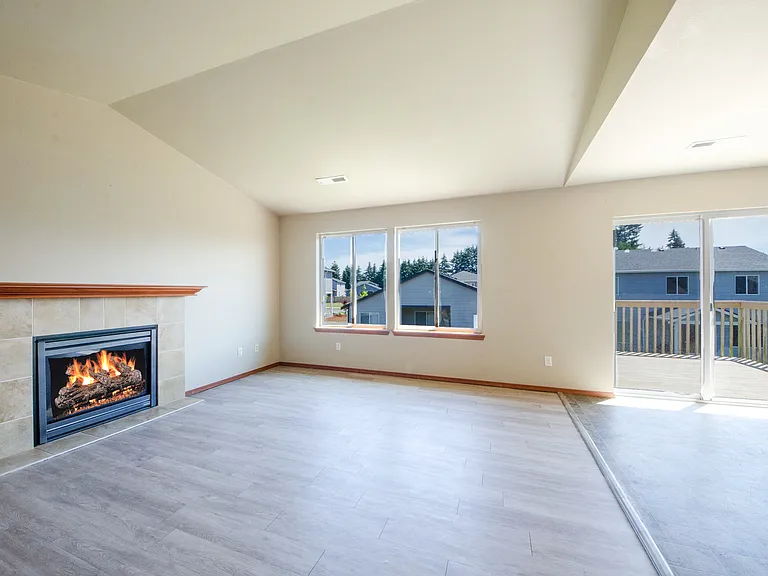 Upper living room with deck access