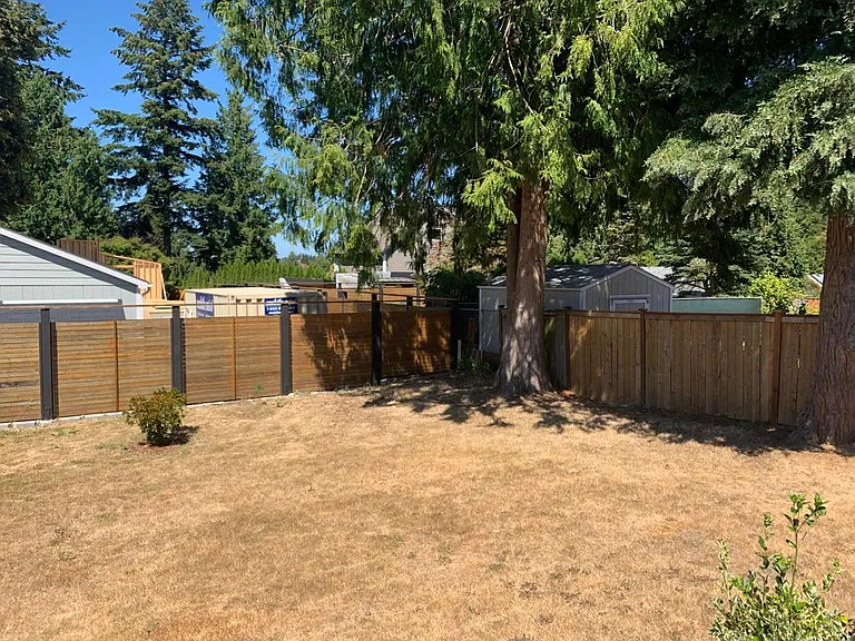 Large backyard (maintained 2x per month during peak season), fenced