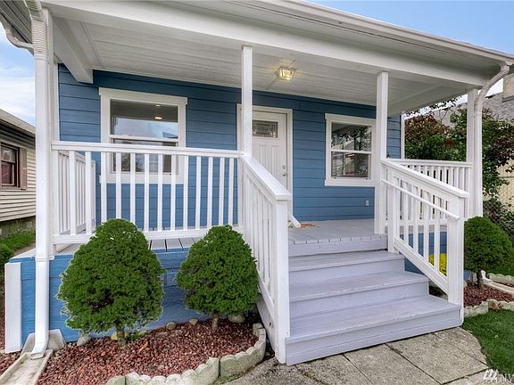 Inviting Over-Sized Pillared Porch