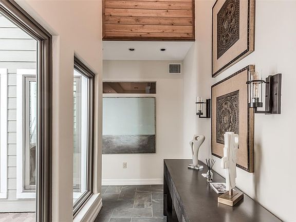 This view of the entry is guiding you towards the incredible living space.