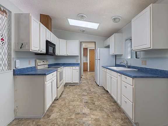 5th image of 211 NE 70th St