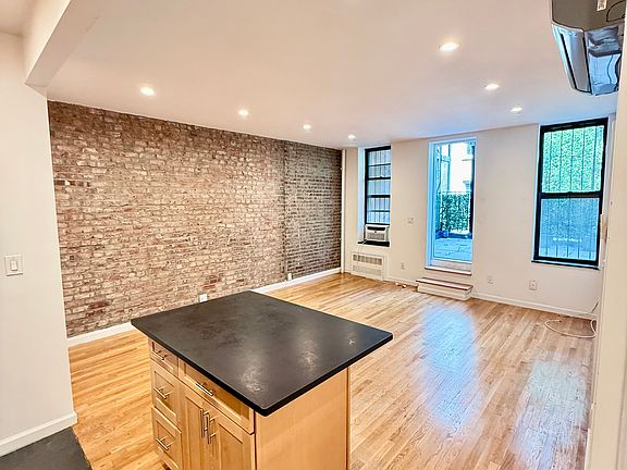 3rd image of 23 W 8th St APT 1C