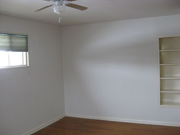 Bright bedroom with built in
