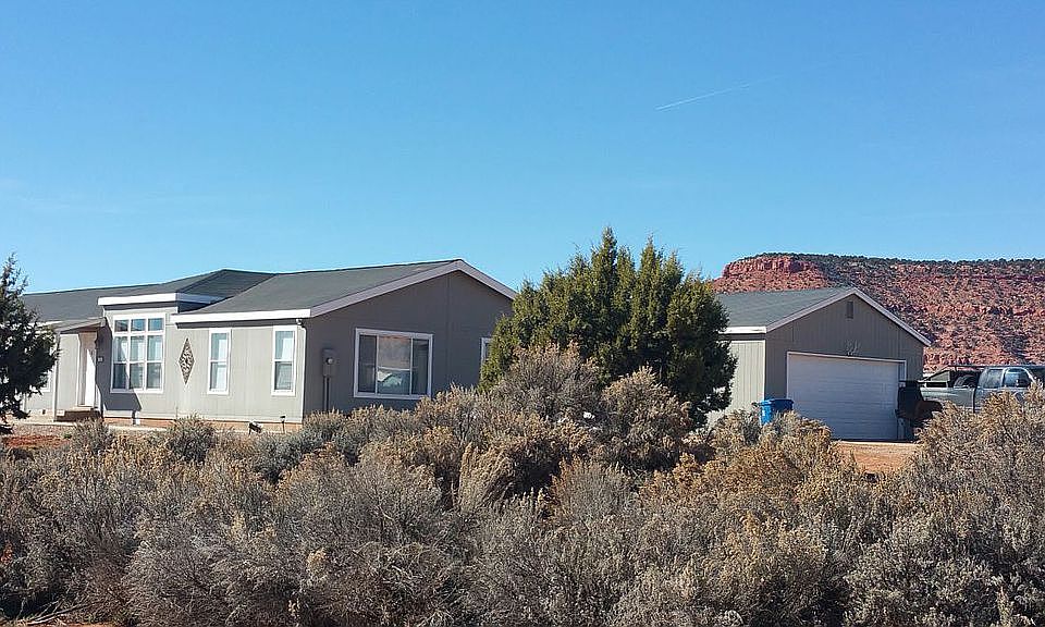 House on Left, Garage on Rt