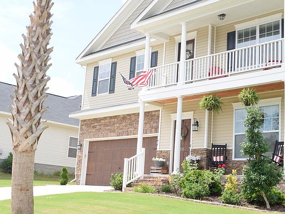 Front view with palm