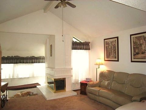 Great Room Features "Corner" Woodburning Fireplace and Conversation Nook