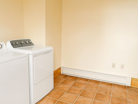 Large laundry room/mud room at ground level. Easy to store bikes, surf boards, etc.