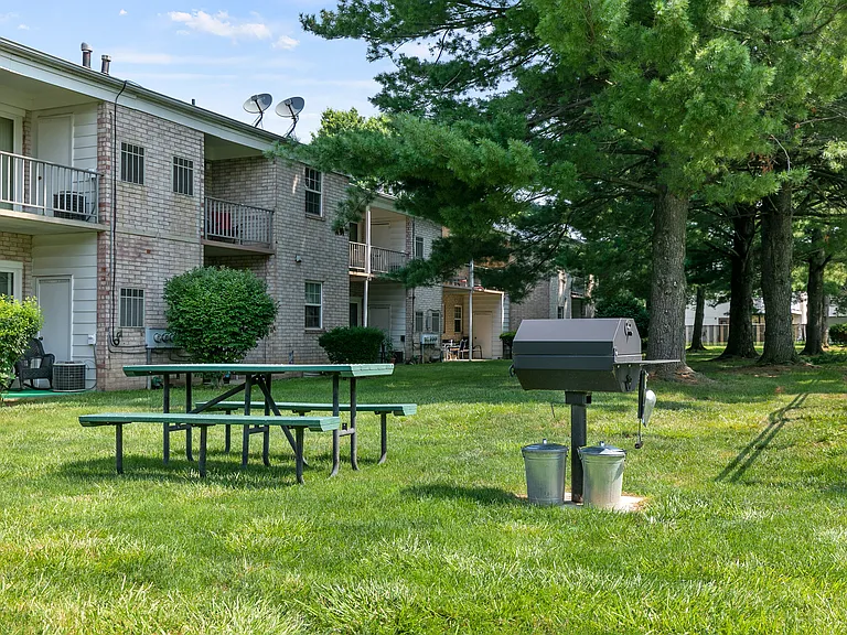 Many picnic areas throughout the property with charcoal grills (we provide the charcoal at no cost to residents)