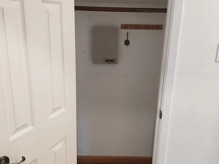 Second Hallway closet(Typically used for coats). Roughly 10 square feet.
